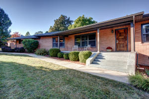 Finally the mid-century masterpiece you've been dreaming about! Beautiful home with over 3200 square feet. Updated but still has that warm contemporary feel with loads of natural light, rich original paneling, large glass door and fantastic entertaining spaces throughout! Gourmet kitchen, new carpet, cedar lined closets, newer heat and air, siding, sofits and fascia.