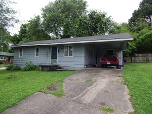 3BR, 1BA home on a corner lot, with one car carport, storage room off carport, CHVAC, all electric home, great starter home, located around the corner from city pool, tennis courts, park, close to downtown square.