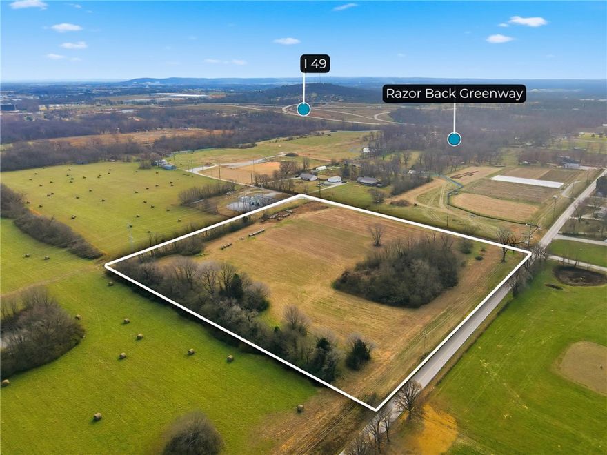 Don't miss this opportunity to own this flat 10 acres centrally located in Lowell. Located very close to Hwy 264, The Razorback Greenway, the 68 acre campus of Providence Classical Christian Academy (broke ground late 2025), and the interstate. This R3 zoned land is a prime spot for developing.