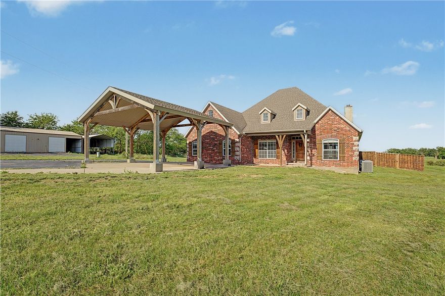 Enjoy the best of space, functionality, and location with this Bentonville property offering over 3,600 sq ft, 6 bedrooms, and 4.5 bathrooms, including multiple suite options ideal for a variety of living arrangements. The home features updated kitchen and bathrooms completed in 2019, along with generous closet space, a wood-burning fireplace, walk-in attic storage, generator hookup capability, public water, and all-electric utilities. Set on approximately 3 level acres, the property includes a 30x50 shop and RV parking with hookups, providing plenty of room for storage, hobbies, or equipment. The setting offers a quiet, private feel while still being conveniently located just minutes from I-49 and nearby Bentonville amenities. With open space, scenic views, and versatile features throughout, this property offers a great opportunity to make it your own.
