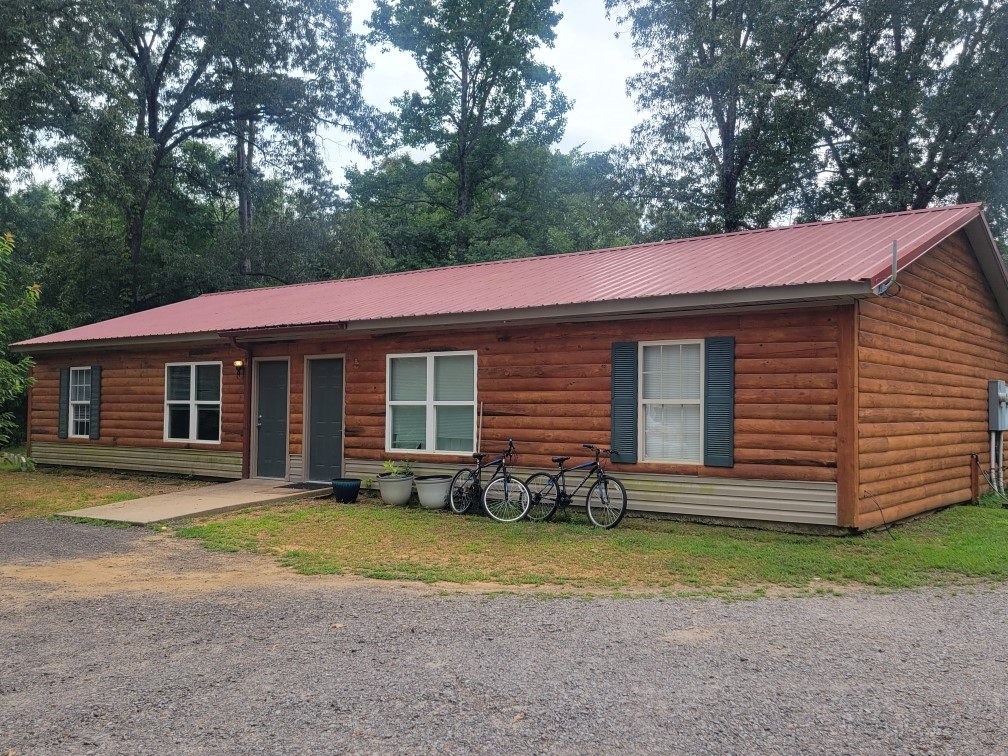 Duplex average for the last 12-month $1500 ($750/side) Gross Monthly Income. Septic system recently updated and improved. Second potential site for another duplex was also designed, same land but double the potential income. Metal roof, owner pays water only approximately $70/month.
