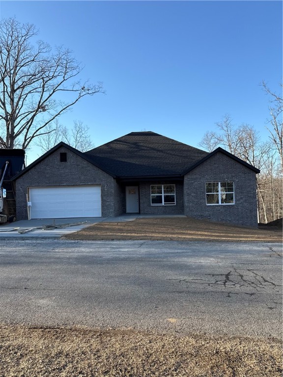 Brand New Construction Single Family Home with lots of upgrades! Just a few minutes to Scotsdale golf course and walking trails. Home comes with amenities like wood look ceramic tile flooring throughout the house, a vaulted ceiling in the living room, 3 cm granite countertops throughout, custom cabinets, pantry, upgraded lighting fixtures, gas log fireplace, a spacious walk in master shower, large walk in closets, covered back deck and more!