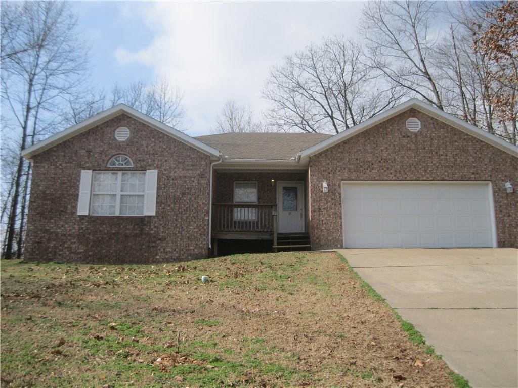 Nice brick home in a private setting. Features include 3 bedrooms, 2 full baths. Tile entry and kitchen area. Granite counters, Gas log fire place, 2 car garage. Enjoy the privacy overlooking wooded area in back. See online application at www.nwarentalhomes.com