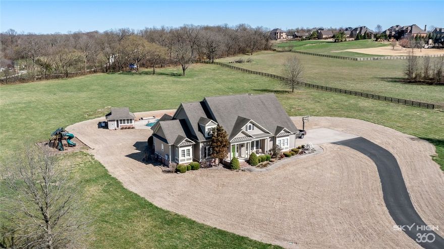 Own your own piece of paradise! Stunning custom 4900 sq ft two-level pool home surrounded by 35+/-  acres provides an ideal location for entertaining family, friends or co-workers.  The 4-stall horse barn, perfect for horse lovers, has a hidden gem -- a second level air-conditioned bonus room with a kitchenette and full bath.  Imagine your own teen gathering place or a private space for those longer term house guests.  This home is made for entertaining with its soaring ceilings, gorgeous hardwood floors, open floorplan, abundant natural light throughout and the stunning pool area.

You can have it all with this home -- location (less than 2 miles to Hwy 112 and a short drive to Bentonville, Rogers, and Fayetteville), privacy, expansive views and a wonderful home anyone would be proud of.