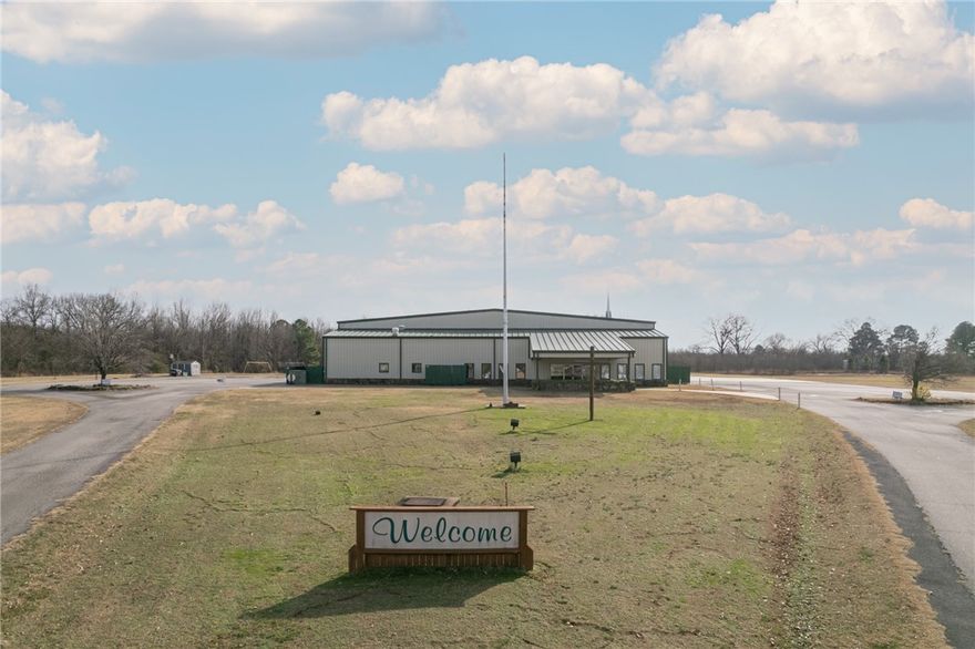 Two large facilities on 17+/- acres with great visibility & approximate 15,000 average daily traffic estimate. Main building is approximately 18,000 sqft & includes several offices, meeting rooms, commercial style kitchen with large freezer/refrigerator, 10+ restrooms & large auxiliary gym with stage. Second building constructed approximately in 2016 & is 14,400sqft. Currently used as a Worship Hall, 2 sets of ADA public restrooms, office, kitchenette & nursery space. Billboard to convey with the property.