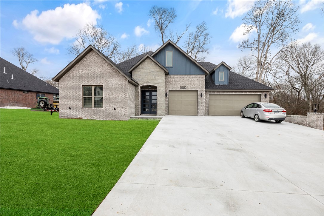 Stunning new build designed for modern living, nestled in a serene setting. This meticulously crafted home offers a spacious open layout that perfectly balances comfort and elegance. Culinary creations await in this beautifully appointed kitchen open to dining and living. Step outside to the deck where you'll enjoy peaceful views of the wooded backyard providing privacy and a natural retreat. The yard is sodded with irrigation and professional landscaping in front.