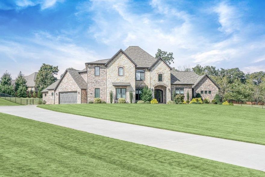 Incredible Talamore Estate! Over 3 Acres w/private pool & beautiful guest living quarters. Landscaping throughout & plenty of privacy provide unbeatable curb appeal. Interior features include wood beams, ship lab details, built-ins & handscraped wood floors. Kitchen is open to living room &breakfast area all w/large windows opening to pool & wooded views. Kitchen features two islands, top of the line appliances including gas range, ice maker, double oven & much more! Living room w/vaulted ceilings & stone fireplace. Guest bedroom w/on-suite on main level. Formal dining & office off entry. Master suite has spa like bath w/soaker tub & huge walk-in shower. Second level has 3 more guest beds all w/own bath. Game room w/wet bar & separate home theatre space. Guest house w/french doors leading out to pool, vaulted ceilings, stained concrete floors, full kitchen w/high-end appliances. Bedroom & bathroom w/washer & dryer hookups.