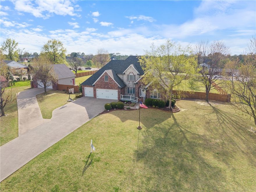 If you could imagine the perfect location, this is it! Nestled near the Rogers Entertainment District, you're just moments away from playing at TopGolf, enjoying a concert at the Walmart AMP, or dining at some of the area's best restaurants.  
This stunning home offers 4 bedrooms, plus an office and a bonus room, all situated on a spacious 1.51-acre lot. With an oversized three-car garage and a large detached garage, it checks all the boxes!  
Located in the heart of NWA, you can reach the new Walmart Home Office in just 10 minutes and be cheering on the Hogs in Fayetteville within 20min. Estate-style lots like this rarely become available—don’t miss your chance to own a piece of prime real estate in the heartbeat of town!