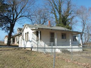 Home has 2bedrooms 1 bath and is an older structure in need of repair. Had been a caregiver home. It as storage building & small barn. Being sold As-Is.