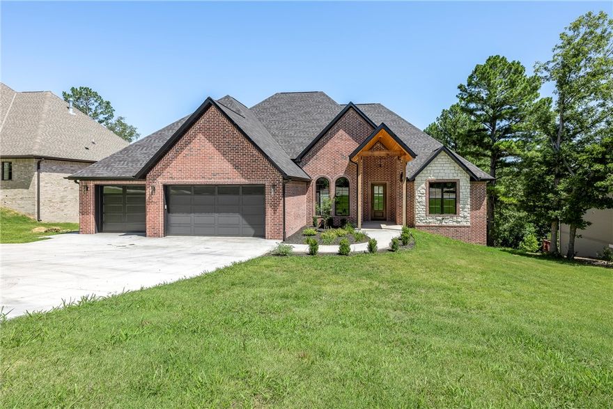 Welcome to your dream home!  This newly constructed 2802 square-foot masterpiece epitomizes modern elegance and comfort, nestled on a pristine .66-acre lot on the Scotsdale Golf Course.  The open, split-floor plan displays high-end features, including upgraded lighting package, 7” wide European oak hardwood flooring, a see-through gas fireplace, expansive Windsor windows fill the home with natural light while the covered deck crafted from TimberTech composite material, offers a serene outdoor retreat.  Attention to detail is evident throughout, custom 3-step trim moldings, Latham custom cabinets, spa-like master bath with curb-less marble shower and soaking tub, Jack & Jill bath between guest bedrooms, half bath for visitors, quartz countertops.  Don’t miss the 3-car garage!  Experience Bella Vista living at its finest.