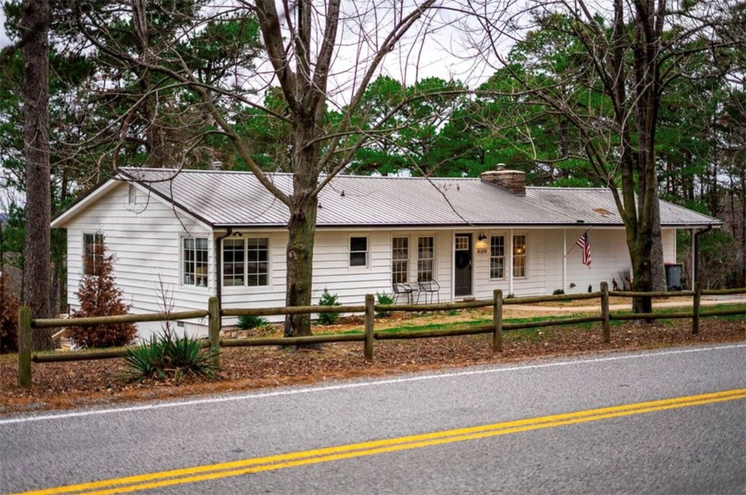 Nestled on 4.8 private acres with direct access to Hobbs State Park trails, Loblolly Pines is a dream retreat for cyclists, hikers, and nature lovers alike. This beautifully renovated home offers a seamless blend of comfort, style, and outdoor adventureāand comes fully furnished, making it a turnkey short-term rental or private getaway. With 4 spacious bedrooms and 3 full bathrooms, the layout is ideal for families or groups. The main level features three bedrooms and two bathrooms, while the lower level offers a large guest suite with its own bathroomāperfect for added privacy. Enjoy serene woodland views from the expansive deck, gather around the cozy fire pit under the stars, and wake up to the sounds of nature. Whether you're looking for a peaceful escape or an income-producing investment, this home delivers. Located just 13 miles from downtown Rogers and 20 miles from the heart of Bentonville, you're never far from dining, shopping, and the vibrant arts and cycling culture of Northwest Arkansas.