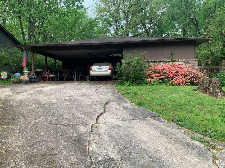 This charming fixer upper sits on a .41 acre lot and is walking distance to Root Elementary. Trails and many restaurants and shops nearby.The livingroom has a beamed ceiling that continues into the kitchen area and 2nd living. Step out onto the large deck overlooking a beautiful backyard that gives you a forest feeling with no neighbors in sight behind you. The hot water tank was replaced a year ago and the HVAC is fairly new. All appliances will remain with the property. The home is being sold "as is". Please proved proof of funds or lender approval with all offers.