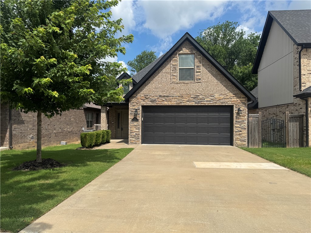 Executive rental home in SW Bentonville. Upgraded features include wood floors, granite counters, custom cabinets, tile backsplash, electric wall fireplace, high ceilings, pantry, tiled master shower, blinds and attic storage. Open floor plan, master suite, powder bath and utility on main level. 2 bedrooms, bonus rm and full bath on 2nd level. Keyless entry, ring doorbell and other smart features. Subdivision includes community pool, clubhouse and exercise room. POA maintains front lawn and irrigation.