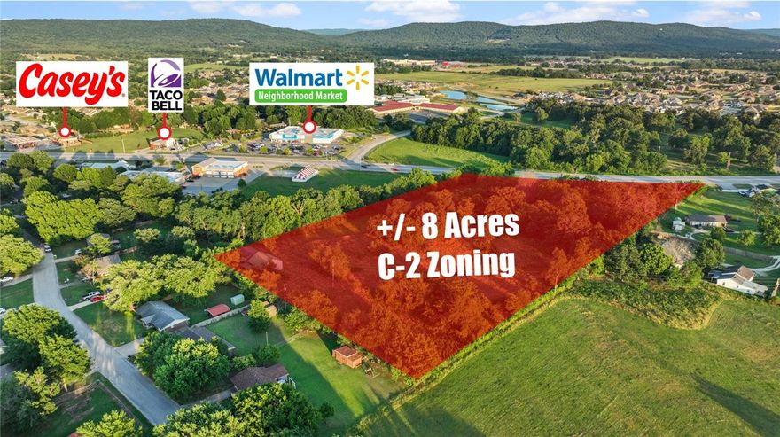 +/- 8 acres of commercial land, zoned C-2, with excellent development opportunities! Located near the Walmart Neighborhood Market and many other businesses! Located on Hwy 62 which sees approx. 30,000 VPD. Water and electric on site. Currently there are stamped and sealed plans for +/- 63,000 SF of self storage. However, this property is perfect for retail, office, industrial, and many other different real estate developments. The City of Farmington has acquired an easement through the north side of the property, taking Grace Ln and extending it across Highway 62, so this property will be situated on a hard corner intersection.