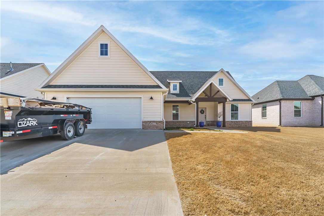 Check out this beautiful 3 bed, 2.5 bath, one-owner house in Prairie Grove. With Brick & Hardie-Board Siding, this house is beautiful inside & out. Luxury vinyl plank on the floor, granite countertops. Call for your showing today!
