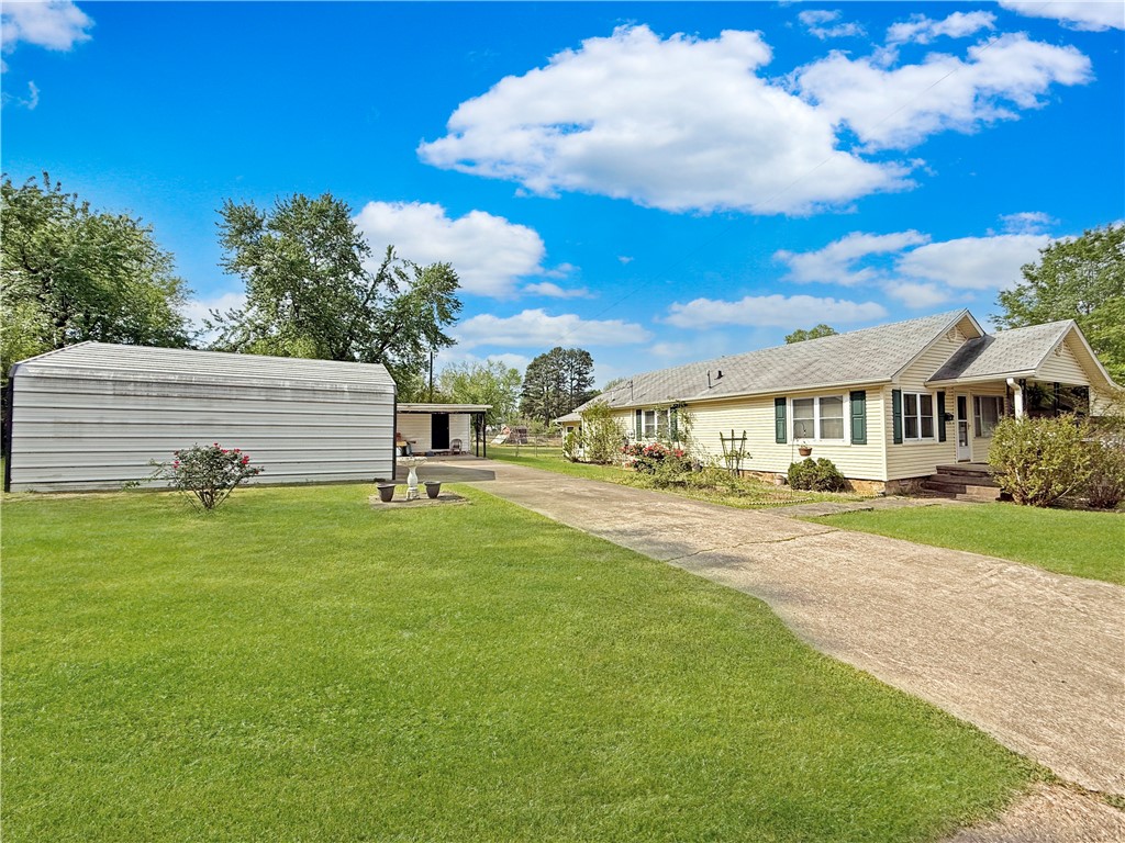 Charming 3-Bedroom Home with Versatile Bonus Room, Detached Shop, and Half-Acre Lot
Discover comfort and functionality in this spacious 1,694 sq ft home situated on a generous 0.50-acre (+/-) lot. Featuring 3 bedrooms and 2 full baths, this well-maintained property offers the perfect blend of indoor and outdoor living.
Step inside to find a flexible additional room that can serve as a 4th bedroom, home office, sunroom, or extra storage—tailored to fit your needs. A brand new roof was just installed in May 2025, ensuring peace of mind for years to come.
The fully fenced backyard provides a private oasis for relaxation or play, while the attached carport, detached garage, and detached carport with shop offer ample space for vehicles, hobbies, and projects.
Whether you're seeking space to grow or a place with room to create, this property has it all. Don’t miss the opportunity to make this versatile and move-in-ready home yours!