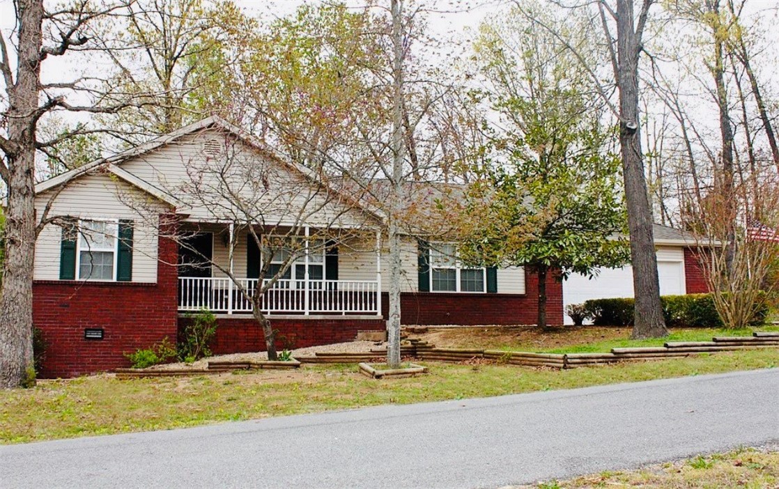 Love the layout and location of this home. The garage is oversized for a boat. The deck overlooks woods for privacy. There is additional parking at the side of the home. Multiple bike trails. 2 miles to Bentonville Dog Park. Please allow 24 hours to view this listing.