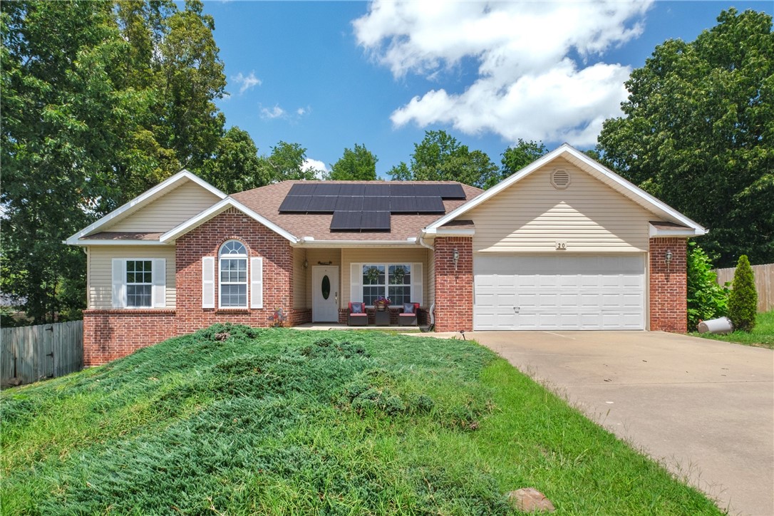 Welcome to your peaceful retreat in beautiful Bella Vista! This warm and inviting 3-bedroom, 2-bathroom home is perfectly positioned near the scenic Blowing Springs Greenway, offering the best of nature and neighborhood charm. Inside, youāll love the flexible layout featuring a formal dining room (or home office!) and a sunroom thatās flooded with natural lightāperfect for morning coffee or winding down in the evening. A double-sided fireplace creates a cozy ambiance between the kitchen and living room, making it the heart of the home. Outside, the flat backyard is ideal for gardening, play, or quiet evenings under the stars. Energy efficiency shines here with paid-off solar panels keeping the average electric bill around just $30/month, plus the added convenience of a sewer connection. This home truly has it allācomfort, character, and a location that puts trails and outdoor adventures right at your doorstep!
