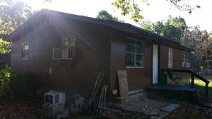 Fixer Opportunity! 2 bedroom, 1 bath home on 2.73 acres located on pavement just a couple miles from city limits. This could be a great deal if you want one to fix up and make your own!