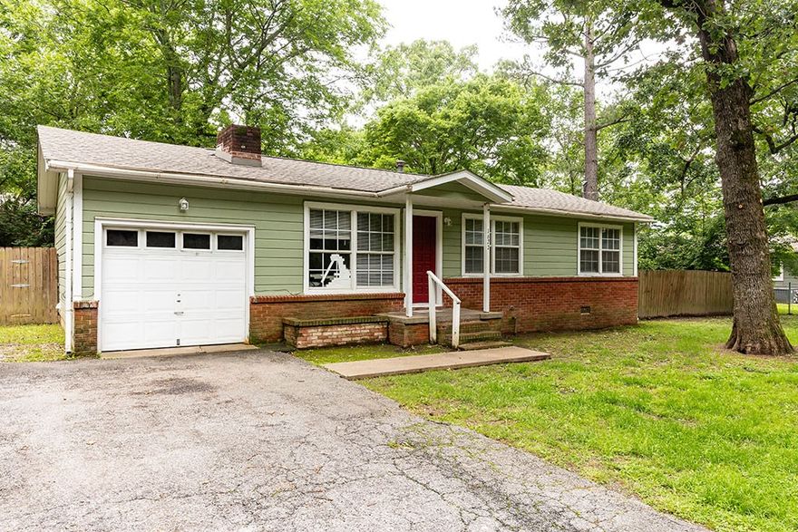 Just in time for the upcoming spring semester, this home is ideally located for the student living. With direct access to Fayetteville's many trails, you can bike out your front door and be on campus in a matter of minutes. Hate exercise? Make the short walk to the nearby transit stop and let the bus driver do the work. So investors and parents with incoming university students will love this place for those reasons, while those looking to stop with the rent payments and buy a little place of their own in the middle of town might also want to have a look. Situated on a quiet, almost secret, little dead end street, surrounded by trees but close to ... like, just everything. End of list. If you want it or need it, city convenience is close by, but you'd never guess it when you're out grilling in the back yard or taking in a moment in the front gazing out into the woods across the street. Lots of recent improvements, and with just a little more cosmetic love this place can really shine!