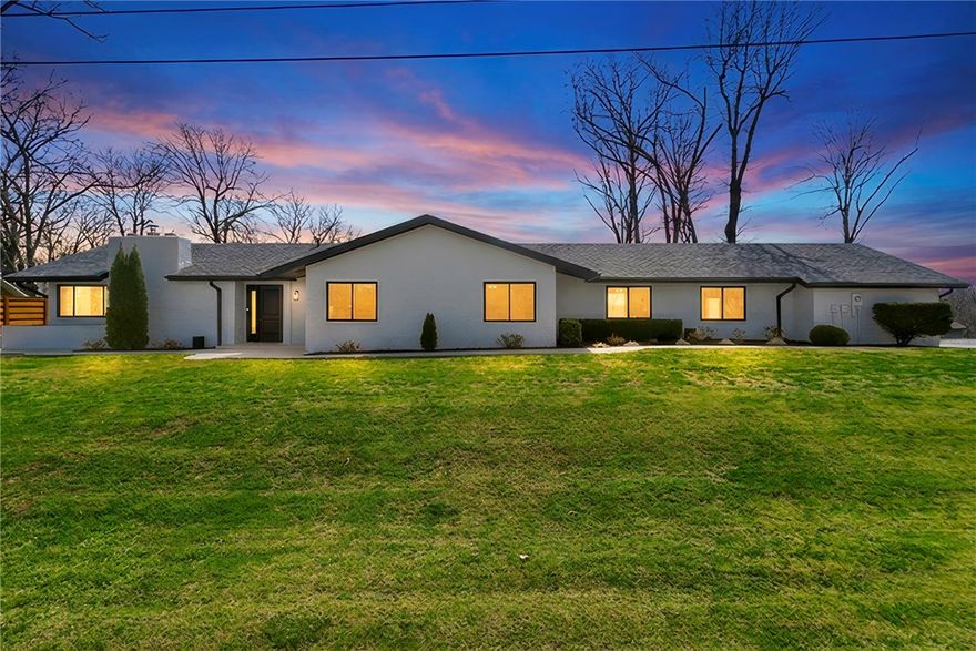 Experience modern luxury and peaceful Ozark living in this fully remodeled 3 bed, 2 bath home with an office/bonus room. This complete remodel features high-end finishes including quartz countertops, premium cabinetry, new vinyl windows, Kohler Fixtures, High End LVP flooring and so much more.
Enjoy your morning coffee while taking in breathtaking mountain sunrises, frequent wildlife, and quiet surroundings.
Centrally located in NWA with already easy access to surrounding cities and will be furthered improved upon completion of the Springdale Northern Bypass that will be constructed about 3.5 miles away.  Hickory Creek park, marina, and boat launch are also just minutes away.
The property includes two parcels totaling 1.38 acres. The .92-acre homesite features an attached garage and barn, while the separate .46-acre buildable lot includes a 24’ x 30’ shop with two 10’ x 10’ doors—perfect for vehicles, boats, or future construction.