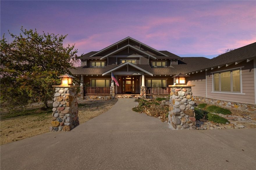 Truly amazing Craftsman Style Custom home that features quality craftsmanship & architectural details. Features 4 bedrooms, 3 1/2 bathrooms with two living areas, wrap around covered porch made of Brazilian Walnut, large lot with over 2 1/2 acres of irrigated lawn with professional landscaping, that offers plenty of elbow room for you to relax & enjoy year-round. This home has all of the bells & whistles with tons of built ins, Oak Trim in every room, wood doors, custom ceilings with wood beams, Colorado River Rock around Fireplace & front porch columns, Luxurious owner's suite, w/Cedar lined walk-in closet, screened in porch. Home is meticulously maintained with a current home warranty in place.  Knolls Subdivision includes a community pool, pool house, tennis court with 4 new pickleball nets & a pond.