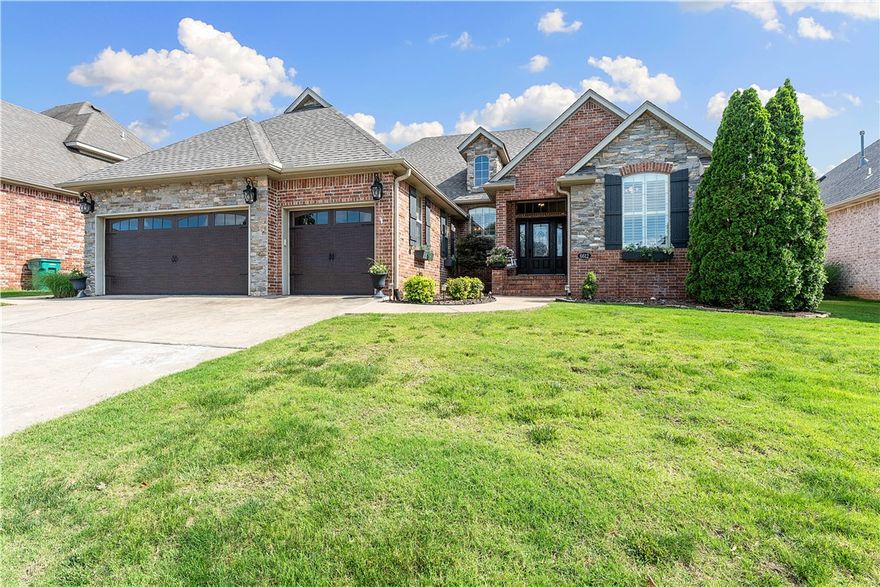 Welcome to this beautifully maintained home located in the highly sought-after gated community of Shadow Valley. Perfectly situated near top-rated schools, shopping, dining, and everything Northwest Arkansas has to offer, this property blends convenience with comfort and elegance. This 3-bedroom, 2.5-bath home also features a dedicated office/bonus room that can easily serve as a 4th bedroom. With 10-ft ceilings, hardwood floors, plantation shutters, and crown molding throughout, the home radiates timeless charm and thoughtful design. The formal dining room and eat-in kitchen offer flexibility for both everyday living and entertaining. The primary suite is a true retreat, featuring tray ceilings, a spacious walk-in closet & an en-suite bathroom with direct access to a serene, heated and cooled sunroom—ideal for year-round enjoyment. The professionally landscaped backyard is private and flat, and the covered patio with pergola is perfect for relaxing or entertaining. Golf membership conveys with the property.