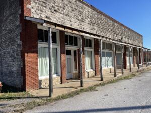 Pyatt Arkansas! Built in the early 1900's, with a little over 7,600 square feet, three separate store fronts, one with a 2 to 3 foot loading dock. 3 ton mini split unit was installed 08/2022, electric heater, and a wood burning stove. The building is all electric with Entergy, water is Pyatt City Water, and internet is available through NATCO. Just 3/10th of a mile to Crooked Creek Access. All numbers are per Marion County Tax Records.
