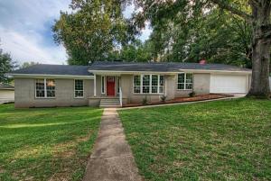 Beautifully remodeled from top to bottom. This 3 bedroom 2 bath 2000 sq ft home sits quietly at the end of a dead end street on the southwest side of Russellville. With an open floor plan, beautiful wood floors, wood burning gas start fireplace and a master suite with enough room for a sitting room, this home checks all of the boxes. Enjoy new paint, drywall, roof, windows, fixtures, bathrooms, granite, appliances and NEW EVERYTHING ELSE! Relax under mature hardwoods in a large backyard off your private master suite deck or on the patio while entertaining guest!