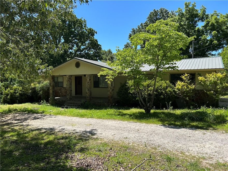 Needs a little TLC and some land cleaning, but this property has the potential to become a charming mini farm! The home features 3 bedrooms and 1.5 baths and sits on approximately 8.1 beautiful acres. With plenty of space for animals, gardening, or simply enjoying country living, this property offers endless possibilities for the right buyer. Peaceful rural setting with room to grow and make it your own!