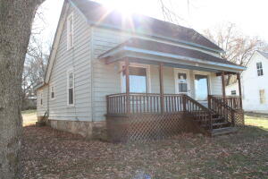 3 bedroom 1 bath Fixer upper. Hardwood floors and great covered porch to enjoy coffee. Great location for a store front right on HWY 412 in Alpena. Sq footage per tax records.