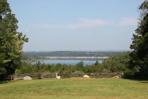 This lake getaway is set up and has enough room for all the family and friends with excellent campsites and a lake view on Bull Shoals Lake near Peel on 6.72 acres. There are 7 RV Hookups, Shower House with Washer/Dryer and Bunk House. Drilled Well and 1500 gallon septic system.''Motivated Seller''