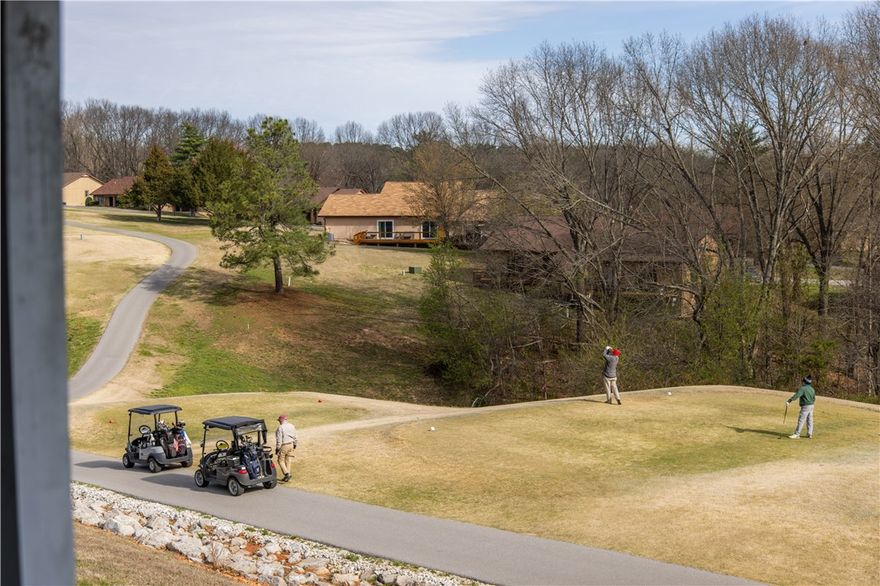 Welcome to your perfect golf-front retreat in Bella Vista! Situated on the 17th hole at Metfield this townhouse offers stunning views and direct access to the fairways of Metfield Golf Complex, making it a dream home for golf enthusiasts and nature lovers alike.    Filled with natural light, this townhouse offers 2 bedrooms and 1.5 bathrooms.    The floor plan is open with brilliant views of the golf course.  Whether you're looking for a full-time residence, vacation getaway, or investment property, this home offers low-maintenance living in a highly desirable location. Enjoy all that Bella Vista has to offer—multiple golf courses, scenic trails, lakes, and community amenities—just minutes from your front door. Don’t miss this rare opportunity to own a golf-front property in one of Bella Vista's most sought-after communities! Townhouse comes with two dedicated parking places.
