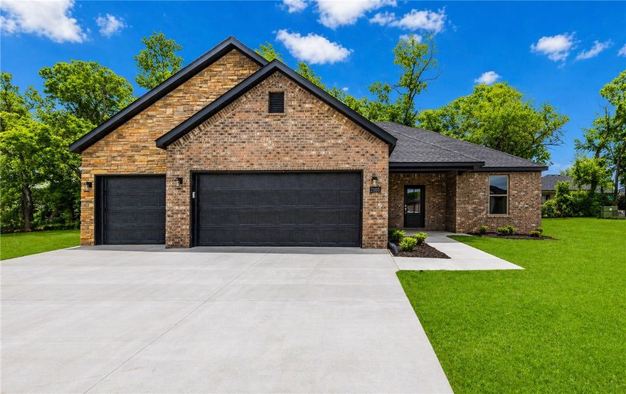 Welcome to this beautiful new construction home in Siloam Springs! This thoughtfully designed home offers a custom interior and exterior design of modern living space with quality finishes throughout. The exterior features classic brick construction, a 3 car garage, & an inviting curb appeal, while inside you’ll find luxury vinyl plank flooring, an open & functional layout, & abundant natural light. The kitchen is equipped with quartz countertops, energy star appliances, eat-in kitchen space, & ample cabinetry. Enjoy outdoor living on the patio. Don’t miss the opportunity to own this move-in-ready new construction home in a growing Siloam Springs neighborhood!