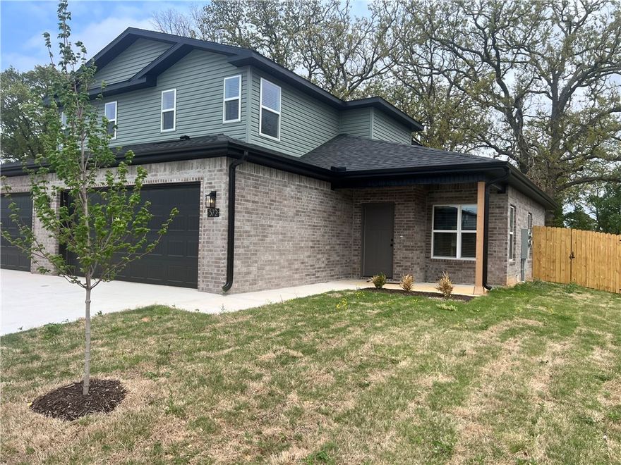 Move in Ready Town home style Duplex offering 3 bedrooms and 2.5 baths in a great Centerton location. The main level features LVP flooring with upgraded carpet on stairs and LVP on the second Floor as well. Kitchen comes equipped with a refrigerator, and the home also includes a washer and dryer for added convenience. Enjoy an attached 2-car garage, a private patio, and a fenced backyard. EV plug in Garage. Located close to area schools, the Walmart Distribution Center, and with quick access to all Centerton and Bentonville amenities. Tenants are responsible for all utilities and lawn care.