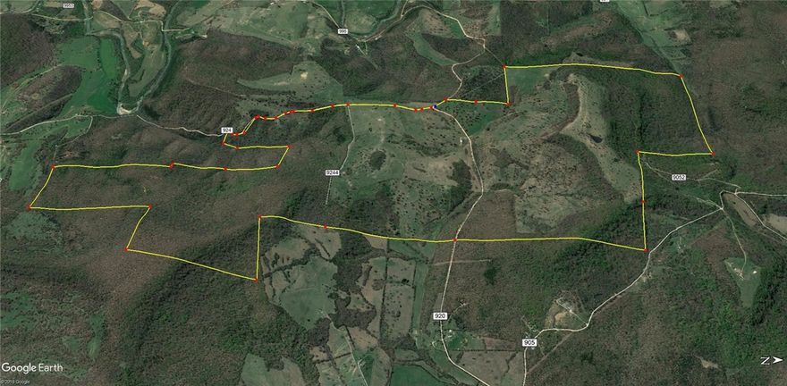 Working cattle farm with approximately 500 acres of pasture cut into 16 different pastures with 5 small catch pens. Pipe corral for working cattle. Lots of springs plus lots of ponds. Owner runs approximately 200 head of cattle. Loaded with deer and turkey. 38x80 Red iron barn. Wind rights do not convey with property.