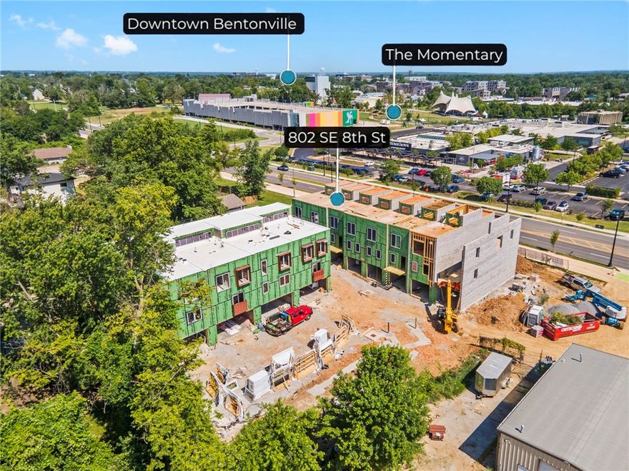 Welcome to LIGHTBOX—Downtown Bentonville’s most distinctive new address. Located directly across from 8th Street Market and steps from Walmart’s new HQ, LIGHTBOX features 12 luxury townhomes with a rare blend of architecture and artistry. Designed by award-winning firm HUFFT, each residence is anchored by a 45-foot light well and clerestory, flooding the interiors with natural light. The NORTH LIGHT units, offer views of The Momentary and features a flexible first-floor suite perfect for an office, guest room, or Peloton studio. The main level is an entertainer’s dream with open concept living and kitchen spaces, while the upper-level houses two private bedroom suites. Details include floating stairs, cinder block walls and two curated finish packages: the soft, organic Neutral Palette or the bold, moody Charcoal Palette. Completion this November. If you crave design-forward living in the heart of it all—this is it. Reserve yours now.