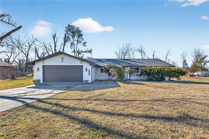 Welcome to 600 S Scott Circle in Rogers — a beautifully updated 3-bedroom, 2-bath ranch home tucked away on a quiet cul-de-sac in the desirable Sundown Subdivision. Offering approximately 1,945 sq ft of living space on a spacious 0.34-acre corner lot, this home blends classic charm with modern updates. Inside, you’ll find an open, light-filled layout featuring oversized bedrooms, a cozy living room with fireplace, and a bright sunroom perfect for relaxing or entertaining. The remodeled kitchen shines with quartz countertops, updated cabinetry, new appliances, and stylish fixtures. Fresh paint, updated flooring, and thoughtful improvements throughout make this home truly move-in ready. Step outside to a large fenced backyard with mature trees, ample space for pets or play, and a covered porch ideal for morning coffee or evening gatherings. Complete with a 2-car garage and convenient access to schools, shopping, and downtown Rogers, this home offers comfort, space, and location all in one.