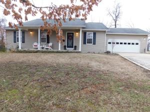 Country Setting only 3 Miles Out !! Spacious 4 bedroom 3 bath home includes full basement with huge 15 x 41 ft family-game room combo. Main floor has living area with vaulted ceiling, nice kitchen and dining area, 3 bedrooms 2 baths and double garage with workbench and storage bins. Walk-out basement has 4th bedroom 3rd bath, family-theater area and game area, storage-mechanical room plus safe room with concrete walls and ceilings. Enjoy the country side view off the rear deck, fenced back yard, 30x30 ft concrete slab with basketball goal, and 12x16 ft storage shed. Location is only 2/10 mile off pavement on white gravel road and 3 miles to Harrison. Come See Today!!