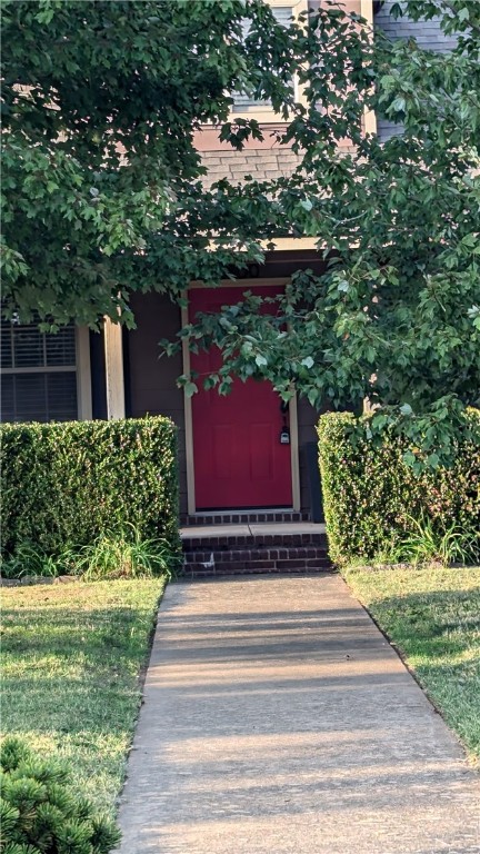 Absolutely beautiful home and Yard. Charming quaint cottage style home with a covered front porch for the evening shade. A side patio for morning coffee with the sunrise and a rear facing garage on private alleyway. Inside boasts a great kitchen with eat in bar and 2 pantry closets. It comes with a supplied washer and dryer in a hall laundry closet. The living room has a wood burning fireplace for cool nights. the house is ready and pet friendly. Come check it out today!