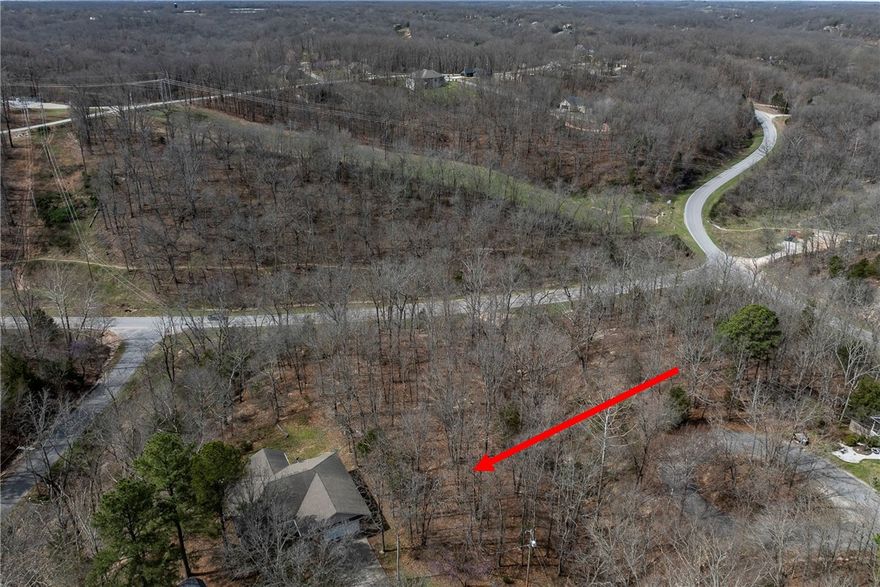 Tucked into the heart of Bella Vista’s growing trail community, Lot 3 Little Borough Lane offers the perfect setting to build your dream home and fully embrace the Ozark outdoor lifestyle. This beautiful ±0.50 acre homesite sits just moments from the area’s most exciting mountain biking experiences, including the new OZ Trails bike lift system along with the popular Tweety Bird Trail and Tunnel Vision Trail. Imagine stepping out your front door, hopping on your bike, and connecting directly to miles of world-class riding through the Bella Vista trail network. Whether you're an avid rider, weekend adventurer, or simply someone who loves living close to nature, this location delivers the lifestyle Northwest Arkansas is known for. The lot provides space for a custom home, outdoor living areas, and room to relax after a day on the trails. Near dining, shopping, lakes and golf, this property offers the rare opportunity to live where adventure begins. Be apart of one of the nation’s premier mountain biking destinations.