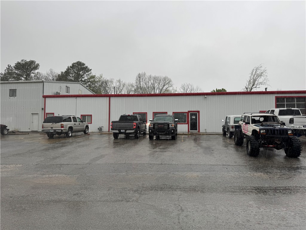 Centrally located in Rogers, plenty of overhead door access, building should be vacant by end of March, property has natural gas heat in warehouse, 3 Phase electric available if needed.