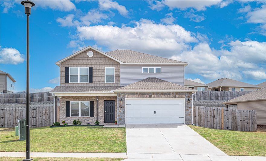 Great home in a sought-after neighborhood with wonderful community amenities! Enjoy paved walking trails that wind throughout the neighborhood and connect directly to Janie Darr Elementary School, allowing kids to walk or bike to school on the sidewalk trail. The community also features a shared green space and playground, perfect for gathering with neighbors or enjoying family walks and time outdoors.

Conveniently located near top schools, shopping, and dining—only about 5 miles to the Pinnacle Hills Promenade area. This two-story home offers 4 spacious bedrooms with large walk-in closets, 2.5 baths, and a very large bonus room upstairs that could serve as a bedroom, game room, or media room. The fenced backyard features a unique rock retaining wall that could be transformed into a charming courtyard-style outdoor space. Easy commute with approximately 9.5 miles to the Walmart Home Office and about 3 miles to J.B. Hunt Transport Services.