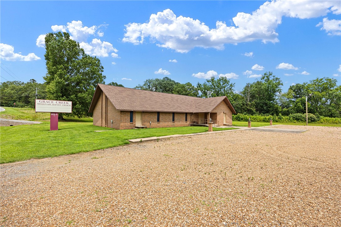 An extraordinary opportunity awaits with this custom-built 3,212 sq ft church on +- 7 acres. Highlighted by soaring Gothic arches, handcrafted pews, and a beautifully designed pulpit, this property radiates spiritual beauty and architectural elegance.
Inside, natural light streams across the sanctuary, creating an inspiring atmosphere for worship, ceremonies, and special gatherings. The grounds surrounding the church offer a setting for outdoor weddings, fellowship events, or thoughtful expansionāperfectly suited for a growing congregation or a visionary wedding venue entrepreneur.
Whether you're seeking a sacred space to serve a faith community or dreaming of hosting breathtaking celebrations, this unique property offers character, and endless possibilities.