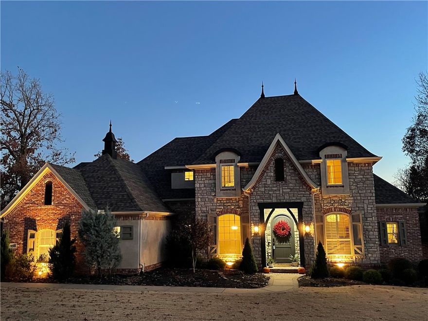 Situated in one of NWA’s premier neighborhoods, this exceptional home exemplifies golf course living at its finest. With its casual elegance and incredible views of the fifth fairway, this entertainer’s dream features gorgeous hardwood floors, a vast living area w/fireplace and built-ins, a gourmet kitchen with a beautiful architectural brick alcove over the cooktop, an expansive island, and a beverage fridge w/additional prep area. Spacious primary suite with access to the vast two-tiered deck with a hot tub, as well as a firepit overlooking the course.  Also featured on the main level are a charming office, dining room, large utility room with built ins. 2nd level boasts 3 bedrooms, each with a private or shared bathroom, two bonus areas. Among the other attributes of this spectacular home are the spacious yard with mature trees, extensive closets and built-ins for storage, wiring for speakers throughout the home, a three-car garage with a separate single door perfect for a car or golf cart, and much more.