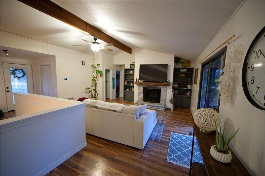 New roof in 2023, 3B/2B w/ 2 additional flex rooms. Complete remodel done in 22 & 23. Basement updated to all sheet rock including ceilings, all new doors & trim, workshop converted to hobby/play room w/ closet, door & window.Updated bathroom vanities and faucets. New energy efficient windows throughout home. New patio slider exit the basement on to a concrete pad & large yard. Kitchen: new SS appliances in 2022. Quartz countertops, new open sink and faucet. Pantry shelves added for storage. all doors updated upstairs, bedrooms UP, updated to sheet rock and crown molding. Wood Burn FP. Exterior has a beautiful update. New paint on cedar siding and brick/block. Dark gray w/ white trim & cedar shutters. Brand new garage door with opener. New carpet in the basement just a few months old. It is a very cozy floorplan, second living room downstairs with 2 B, 2 flex rooms and a childs reading/ sleep nook under the stairs. This home has solid bones & had only 4 prior owners. Near bike trails, see Lake views on short walks.