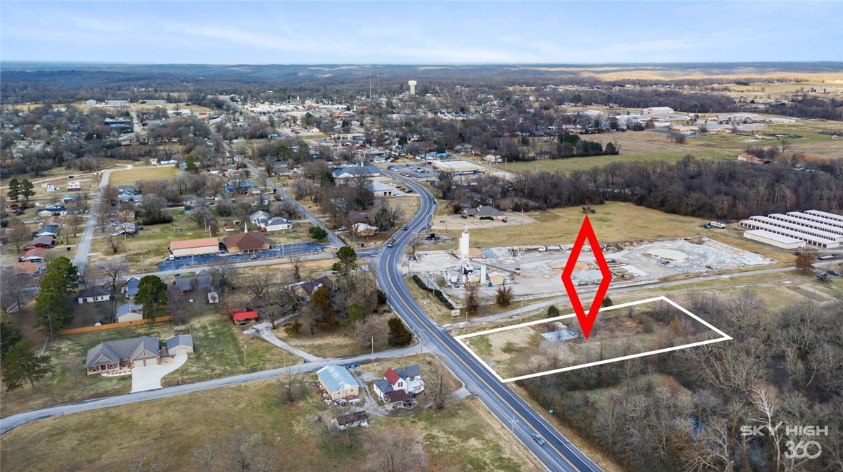 Located just South of the main 4 way stop in Gravette; this flexible and useful property would be an excellent choice for any business needing a great location. Boasting 150' of Highway frontage with close proximity to schools and other businesses. Premium location and visibility with over 9,800 VPD! Property is close to Harps, Simple Simons, Caseys, Arvest, CV family foods, Dollar General, Glenn Duffy Elementary School, Gravette Middle School, Gravette Upper Elementary, Sonic, Subway, and the new Taco Bell.