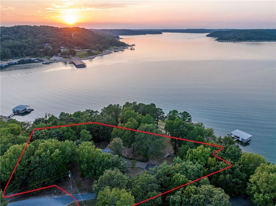 Welcome to PARADISE! This adorable cabin, which sits directly across from Coppermine Lodge, is nestled on a gorgeous piece of property. It can be a home away from home or a permanent residence, enjoying lake life at its finest. INCREDIBLE investment opportunity! The primary property that the cabin sits on has been perc tested for up to a 3 bedroom home & sits on 1.02 Acres. The 2 lots that overlook the primary property w/ great lake views, have been perc tested to accommodate up to a 4 bedroom home consisting of 1.2 Acres. The property also has its own private 2 slip dock w/ swim deck and includes a 2006 Voyager pontoon! Feels like your own private island! This is a must see slice of HEAVEN!