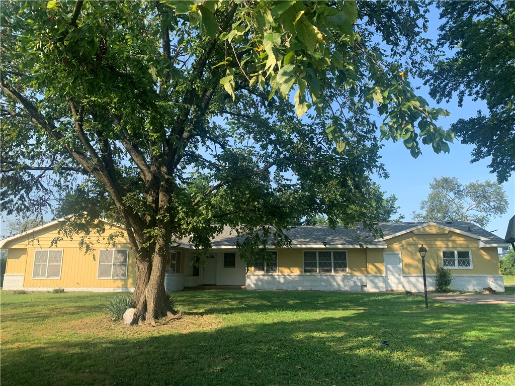 Convenient in-town location with plenty of room & privacy! Come check out the spacious 2,257 sq. ft. one level home on 2.5 acres. The plan has flexibility with bonus space, lots of natural light and a newly painted interior and exterior. Includes all appliances plus a washer/dryer. Large shade trees with private gravel drive, covered back patio area, parking pad and attached two car garage are within the larger fenced parameter of the property. Lawn care is provided by the owner. Showings to begin August 4, 2025.