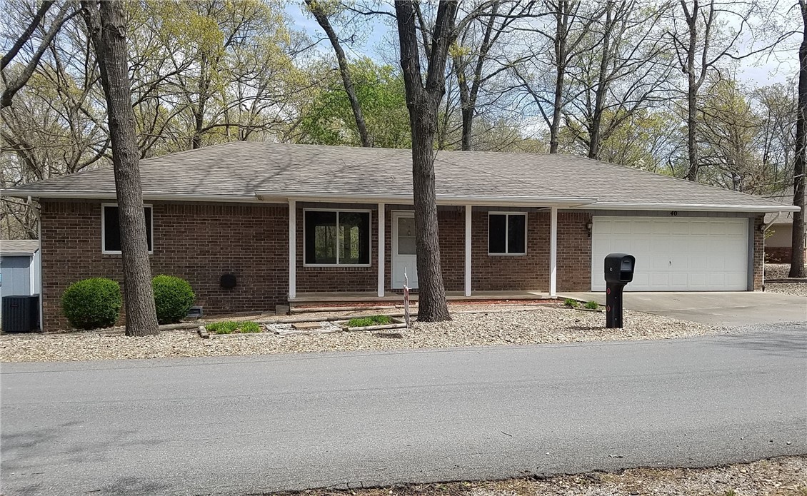 This charming three-bedroom, two-bathroom residence features a split floor plan, a two-car attached garage, an enclosed sun room, and a generously sized lot. Conveniently located near Huntley Gravity Park, shopping, and dining. The property boasts an eat-in kitchen and a separate dining area. The slightly sloped backyard offers a view of wooded common areas, a storage shed with electricity, ideal for a workshop. Available for immediate occupancy.